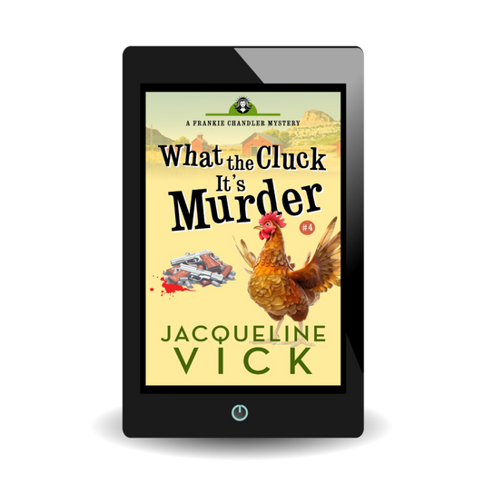 A book cover with a chicken next to a pile of guns. The title is What the Cluck It's Murder, a Frankie Chandler mystery, by Jacqueline Vick.